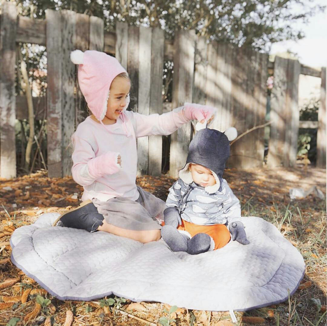 Siblings wearing Bedhead Teddy Fleecy Beanies