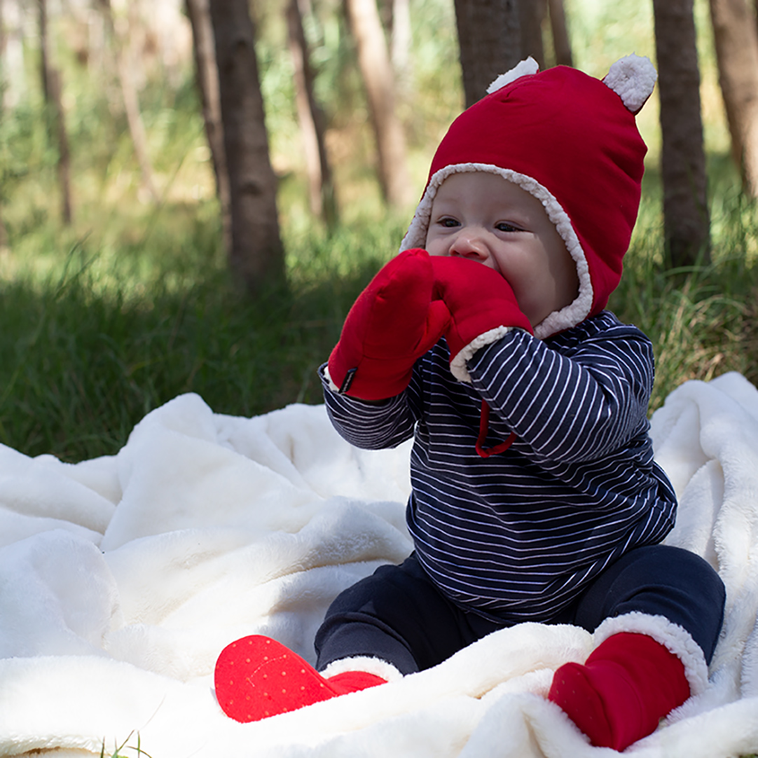 Baby wearing red Bedhead Beanie, Mittens and Booties