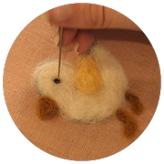 Glue onto strip of fluffy fabric