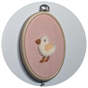 kids hand colouring in bear