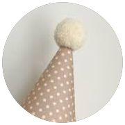 pom pom on top of party hat