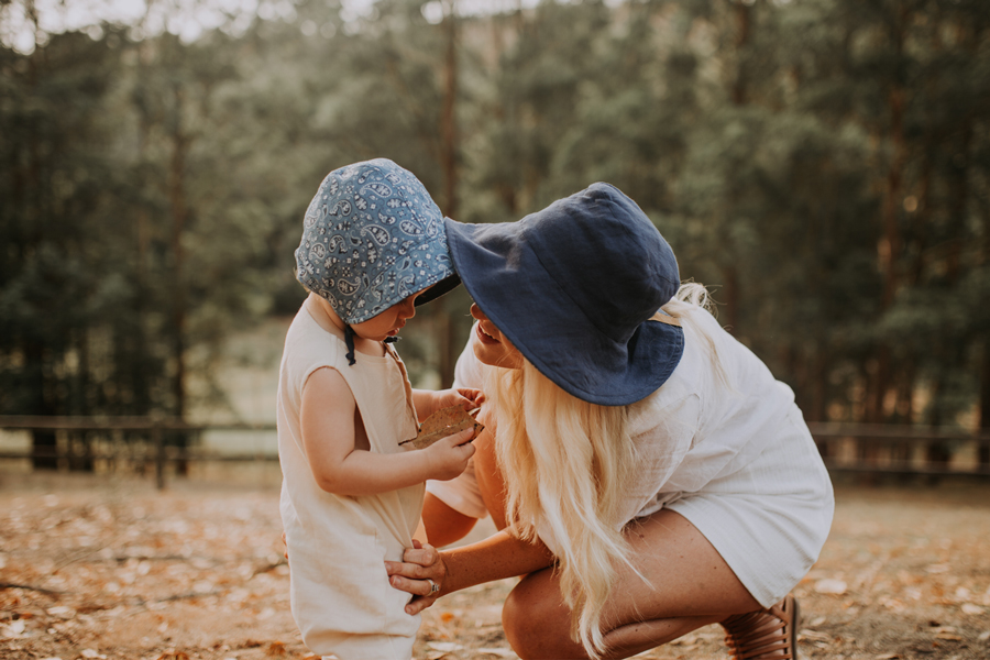 women in ladies linen sun hat with toddler in baby bonnet sun hat 