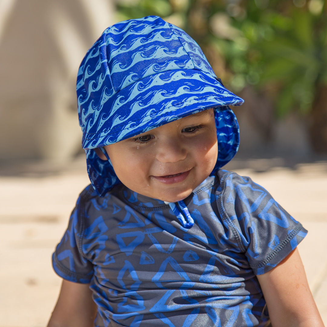 Toddler boy wearing Bedhead swim legionnaire breaker ocean