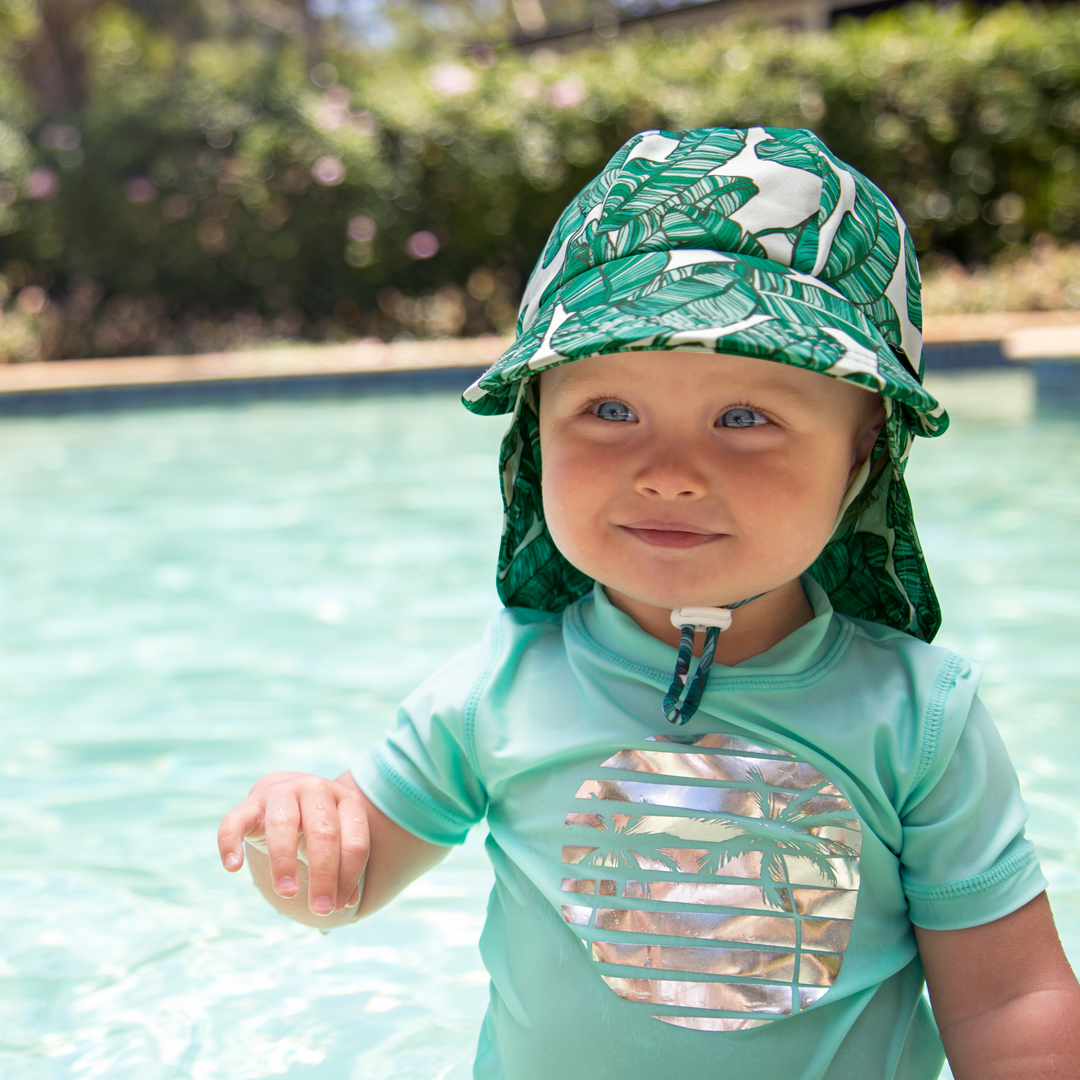 Toddler girl wearing bedhead swim legionnaire jungle