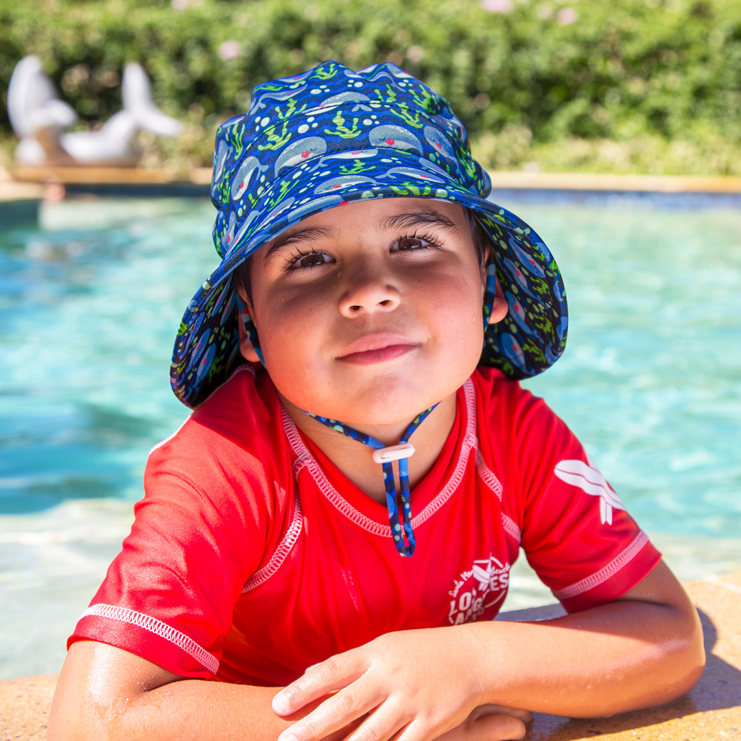 Boy wearing Bedhead swim bucket hat whale