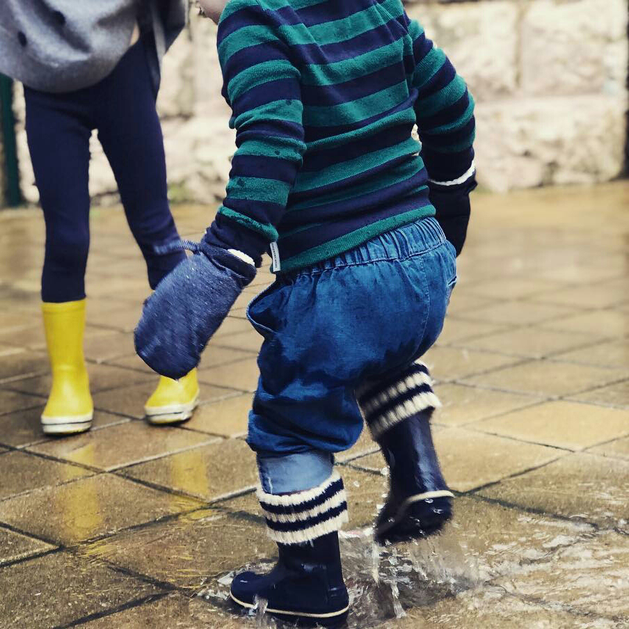 Toddler wearing Bedhead Baby Mittens in Denim