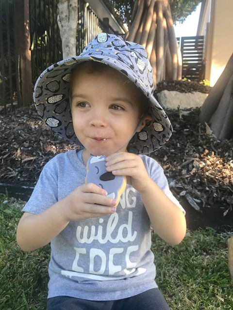 Boy wearing Bedhead Classic Bucket Hat 'Penguin' Print