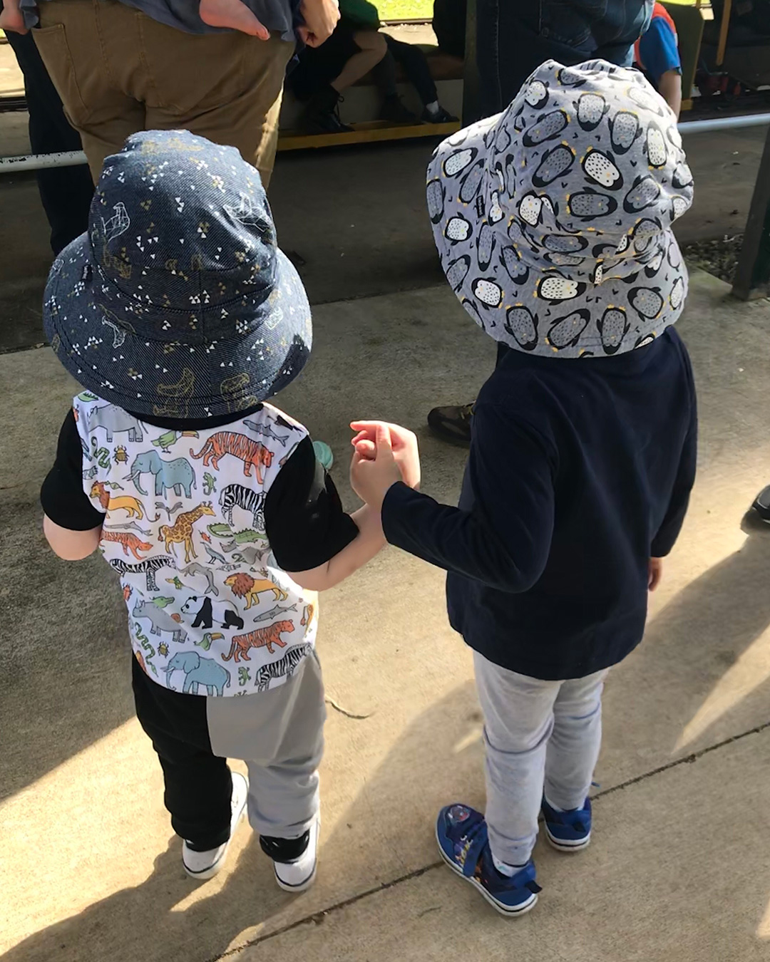 Two boys wearing Bedhead Classic Bucket Hats