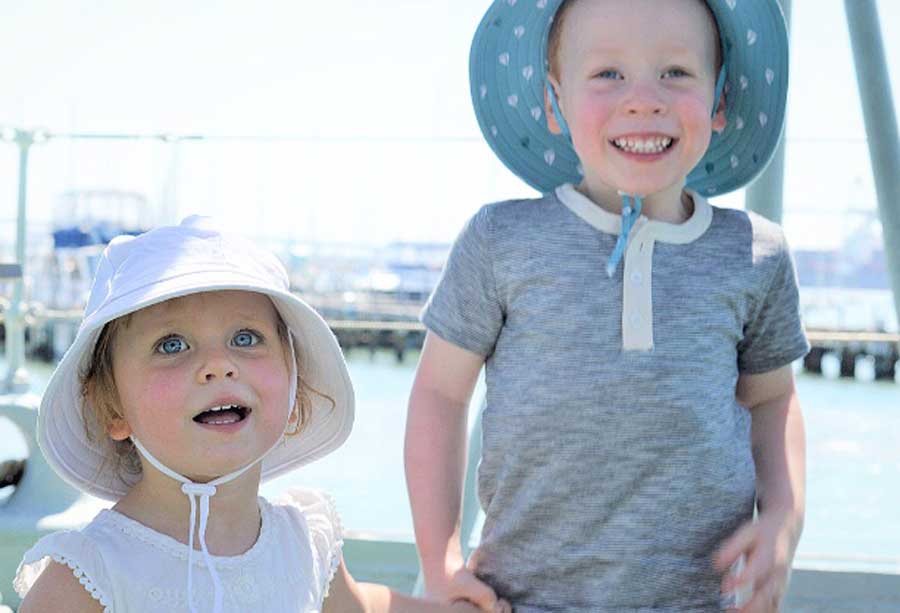 9 ways to get children to keep their hats on their head